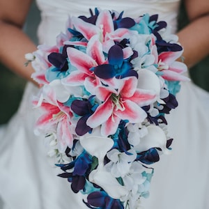 Cascading, teardrop bridal bouquet with tiger lilies, galaxy orchids, turquoise orchids, purple blue orchids, island, artificial flower