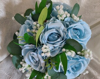 Blue bridal bouquet with roses, baby's breath and eucalyptus leaves