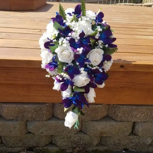 Cascading, teardrop bouquet, bridal bouquet,rose and galaxy purple blue orchids with babys breath, rustic country bouquet