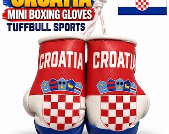 May include: A pair of mini boxing gloves featuring the red, white, and blue colors of the Croatian flag. Each glove displays the word CROATIA in white text above the red and white checkered shield and the crest of the Croatian coat of arms.