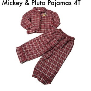 May include: Red and white plaid pajamas set for children. The set includes a button-down shirt and matching pants. The shirt features a small Mickey Mouse and Pluto graphic. The text "Mickey & Pluto Pajamas 4T" is at the top.