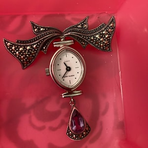 Vintage Judith Jack Sterling marqusite watch brooch with purple quartz pendant