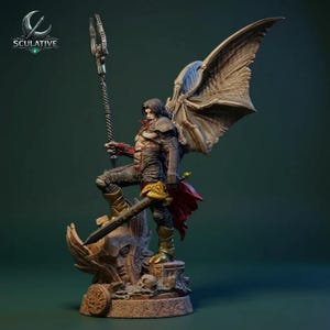Puede incluir: Figura detallada de un personaje de pelo oscuro con grandes alas de murciélago, sosteniendo un báculo y una espada. La figura está posada sobre una base de piedra con una cara tallada. La paleta de colores incluye tonos de marrón, rojo y dorado.