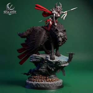 May include: A detailed figurine of a warrior woman riding a wolf with feathered wings. The woman wears armour and a red cape, holding a spear. The wolf is black with yellow eyes, perched on a rocky base with skulls.