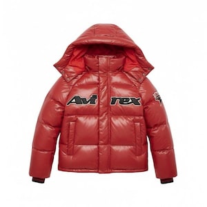 May include: A red puffer jacket with a hood. The jacket features the text "Avi Rex" in black and white on the chest. The jacket has a glossy finish and a black trim on the cuffs.