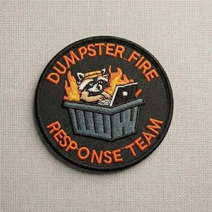 May include: A set of three ceramic mugs with a speckled, matte finish. The mugs are in shades of cream, light gray, and dark gray. Each mug has a simple, minimalist design, perfect for coffee or tea.