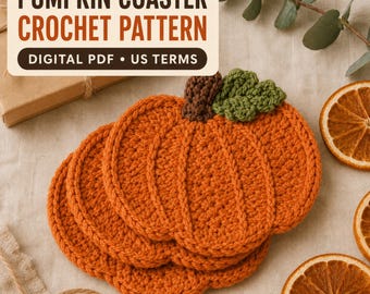 May include: Three orange pumpkin-shaped crochet coasters with brown stems and green leaves. The text PUMPKIN COASTER CROCHET PATTERN DIGITAL PDF US TERMS is displayed in a white box above the coasters, which are arranged on a light fabric.