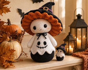 May include: A large and a small crochet doll, both featuring white ghost bodies with black stitched faces, wearing black witch hats with orange ruffled brims and purple bands with gold buckles. The dolls have black rounded bases.