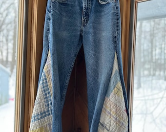 Levi's VINTAGE ORANGE TAB para hombre rediseñados con paneles de barril acolchados vintage