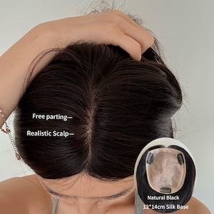 May include: A dark brown hair topper with a realistic scalp and free parting. The image includes a close-up of the hairpiece, with the text "Natural Black 12*14cm Silk Base".