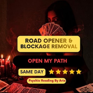 May include: An image with a dark, mystical theme. A person holds tarot cards, with text overlayed: "ROAD OPENER & BLOCKAGE REMOVAL", "OPEN MY PATH", "SAME DAY", and "Psychic Reading By Aria". Lit candles and tarot cards are on a table.