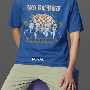 May include: Royal blue t-shirt featuring a graphic of the band No Doubt with the text "No Doubt" in a vintage font. The shirt also has the text "Sphere Las Vegas" and the word "Royal" at the bottom.