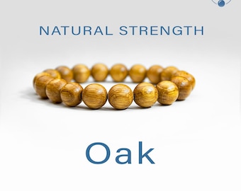 Pode incluir: Uma pulseira de contas de madeira de carvalho. As contas castanho-claras estão dispostas em círculo. O texto "NATURAL STRENGTH" e "Oak" são exibidos em azul. Produto de madeira natural.