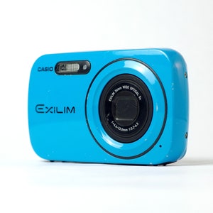 Casio Exilim EX-N1 Blu Fotocamera digitale ultracompatta, vintage anni 2000, Testata e funzionante con batteria, caricabatterie e scheda SD nuovi
