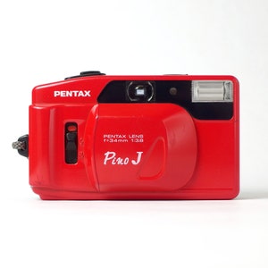 ペンタックス ピノ J 希少なレッド ビンテージ 35 mm コンパクト