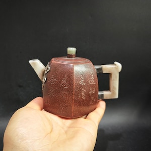 Tetera hexagonal Yixing Zisha antigua, con boquilla y asa de jade incrustado y montura de plata, cerámica de arte del té para eruditos chinos.