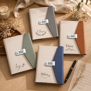 May include: Four rectangular journals with cream-colored covers and colored side flaps featuring silver combination locks. Each journal is personalized with a name and a small graphic: Clara with a wreath, Theo with mountains, Ivy with a flower, and Miles with a star.