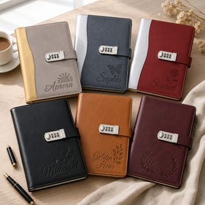 May include: Six rectangular journals with combination locks, featuring varied colors including gray, blue, red, black, tan, and dark maroon. Each journal displays a unique embossed name and graphic, such as a sun, butterfly, rose, stars, or leaves.