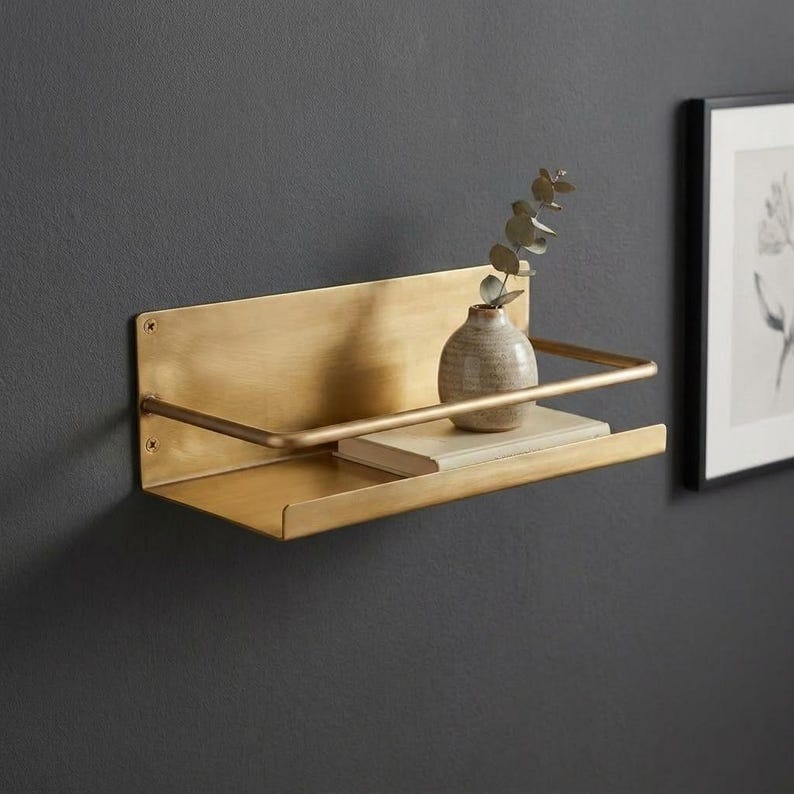 Brass Wall Shelf

Floating Brass Ledge

Gold Bathroom Shelf

Gallery Rail Shelf

Solid Brass Decor

Luxury Spice Rack

Mid Century Modern

Industrial Shelving

Apothecary Shelf

Handcrafted Brass

Entryway Organizer

Metal Floating Shelf

Unlacquered Brass