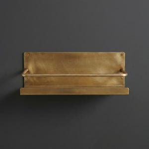 Brass Wall Shelf

Floating Brass Ledge

Gold Bathroom Shelf

Gallery Rail Shelf

Solid Brass Decor

Luxury Spice Rack

Mid Century Modern

Industrial Shelving

Apothecary Shelf

Handcrafted Brass

Entryway Organizer

Metal Floating Shelf

Unlacquered Brass