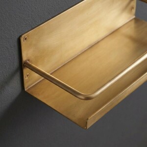 Brass Wall Shelf

Floating Brass Ledge

Gold Bathroom Shelf

Gallery Rail Shelf

Solid Brass Decor

Luxury Spice Rack

Mid Century Modern

Industrial Shelving

Apothecary Shelf

Handcrafted Brass

Entryway Organizer

Metal Floating Shelf

Unlacquered Brass