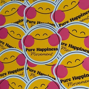 May include: A pile of yellow stickers featuring a smiling face design and the words "Pure Happiness Movement." The stickers have pink cheek accents and a white border. The background is filled with overlapping stickers.