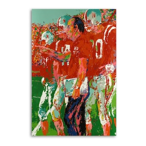 May include: An abstract painting of a football team in red uniforms with the number 10 visible. The coach is pointing, holding a clipboard. The background shows a crowd and a green field.