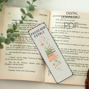 May include: A rectangular cross-stitch pattern bookmark featuring the text "PAGES AND PETALS" in black, accompanied by a stack of colorful books with a floral arrangement emerging from the top, presented as a digital download PDF file.