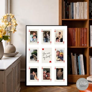 May include: A rectangular wall art print featuring a grid of nine playing card designs. Eight cards display personal photographs of couples, while the center card features the black cursive text You won my heart with a red heart icon above and below.