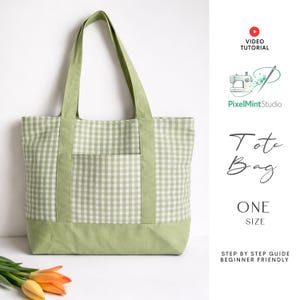 May include: A green and white gingham tote bag with a solid green base, handles, and pocket. The bag has the words "Tote Bag" and "ONE SIZE" printed on the side. A video tutorial is also advertised.