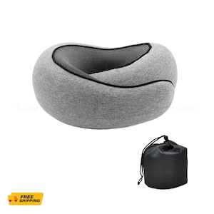 May include: A gray travel neck pillow with a black and white striped interior and a black drawstring carrying bag. The pillow is designed for comfort and support during travel.