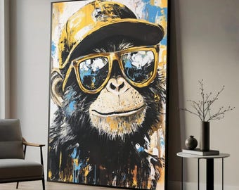 Canvastavla med porträtt av en apa, gula solglasögon i mössa, trendig väggkonst