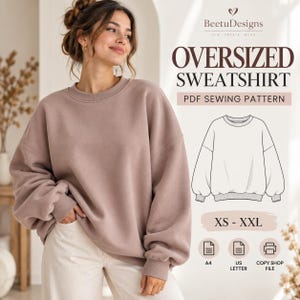 Puede incluir: Una sudadera oversize de color malva con cuello redondo y mangas largas con puños y dobladillo acanalados. La imagen incluye el texto BeetuDesigns, OVERSIZED SWEATSHIRT, PDF SEWING PATTERN, XS - XXL, A4, US LETTER y COPY SHOP FILE.