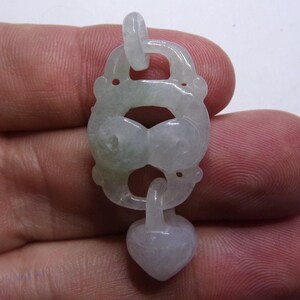 jade pendant. articulated
