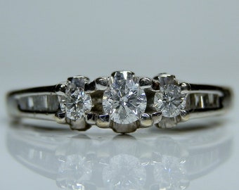 Ladies Engagement Ring, 1/2ctw. Diamond & 14k White Gold. Size 8 3/4. Side Diamonds. Baguettes on the Shoulders