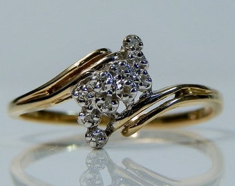 14k Gold & Diamond Bypass Ring. Size 7 1/4. 10 total natural diamonds.