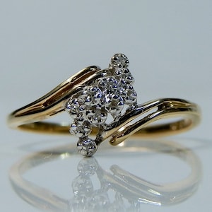 14k Gold & Diamond Bypass Ring. Size 7 1/4. 10 total natural diamonds.