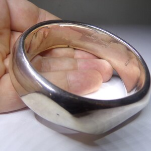 Signed, 48g Sterling Silver Bangle Bracelet. Backed Silver. 8&quot; circumference. 64mm internal diameter