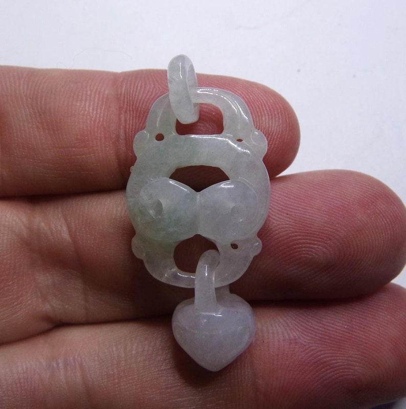 jade pendant. articulated