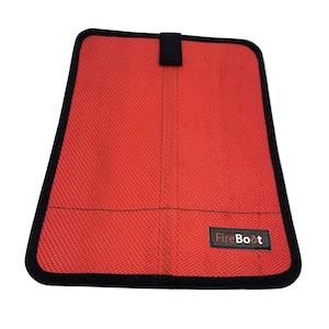 May include: A rectangular red protective sleeve with a textured surface and black trim along the edges. It features a small black tab at the top center and a black rectangular label in the bottom right corner with the white text FireBoot.