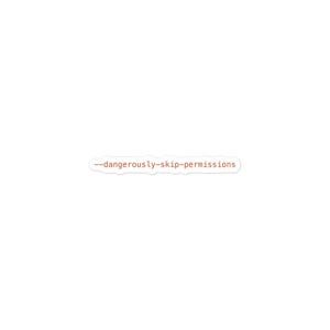 May include: A rectangular sticker with a white border and a white background featuring the text --dangerously-skip-permissions in a brown, monospaced font. The sticker has a die-cut shape that follows the contour of the printed text.