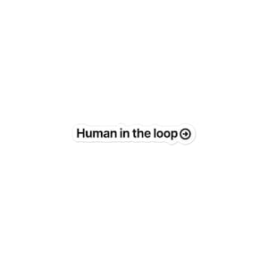 May include: A die-cut sticker featuring the black text "Human in the loop" followed by a circular icon containing a right-pointing arrow. The sticker has a white border and a clean, simple design suitable for application on various smooth surfaces.