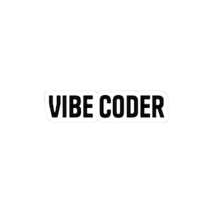 Puede incluir: Una pegatina blanca con la frase "VIBE CODER" en letras negras y en negrita. El texto está centrado y tiene un borde negro.