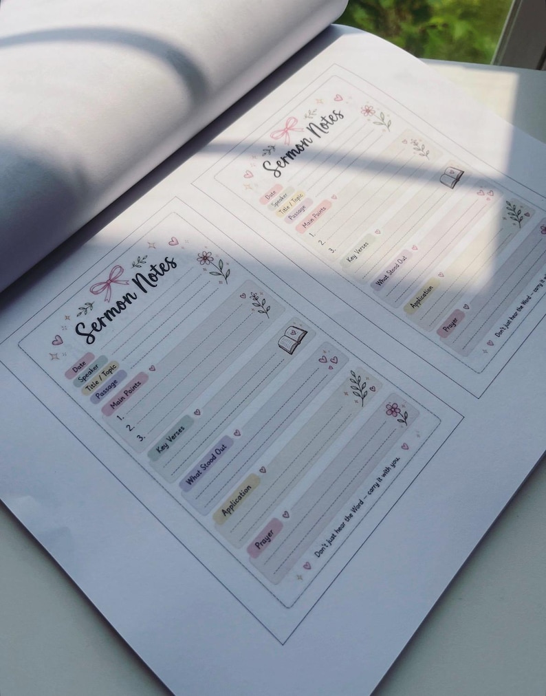 May include: A white paper sheet featuring two identical printed sermon note templates. Each template includes the header Sermon Notes, a pink bow illustration, floral accents, and sections for date, speaker, topic, passage, main points, key verses, application, and prayer. The text Don't just hear the Word&mdash;carry it with you is printed at the bottom.