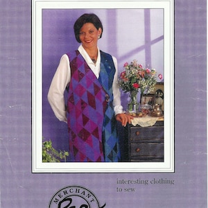 May include: Image of a woman wearing a long vest with a geometric pattern in shades of purple and blue. The vest is labeled "Victoria's Vest". The image also includes the text "interesting clothing to sew" and the "Merchant Rag" logo.