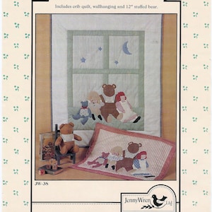May include: A nursery-themed pattern with the text "The Nursery Window." The image includes a crib quilt, wall hanging, and a 12-inch stuffed bear. The design features a window with stars and a moon, and teddy bear figures.