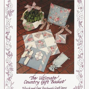 May include: A craft pattern titled Four Corners The Ultimate Country Gift Basket 9 Quick and Easy Patchwork Craft Items 3600. The image displays a fabric basket, a floral pillow, a patchwork square, a small pouch, and other textile items.