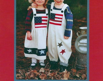 k.p. & co. Peto holgado extragrande con estampado de bandera para niños y niña. Tallas: S (2-3), M (4-5) y L (6-6X). ¡Absolutamente adorable! Novedad de Kari Pearson.