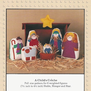 May include: A sewing pattern titled Soft Stuff featuring a nativity scene with six weighted figures, a stable, a manger, and a star. The pattern includes instructions for figures ranging from 4.5 inches to 7.5 inches tall, dated 1994.