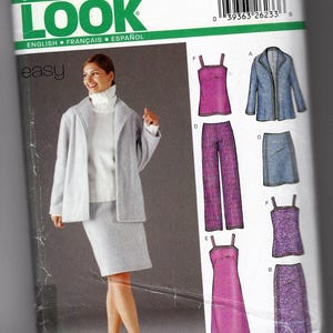 May include: A New Look sewing pattern featuring a woman in a light gray suit. The pattern includes options for a jacket, skirt, pants, and various tops and dresses. The text "NEW LOOK" is at the top.
